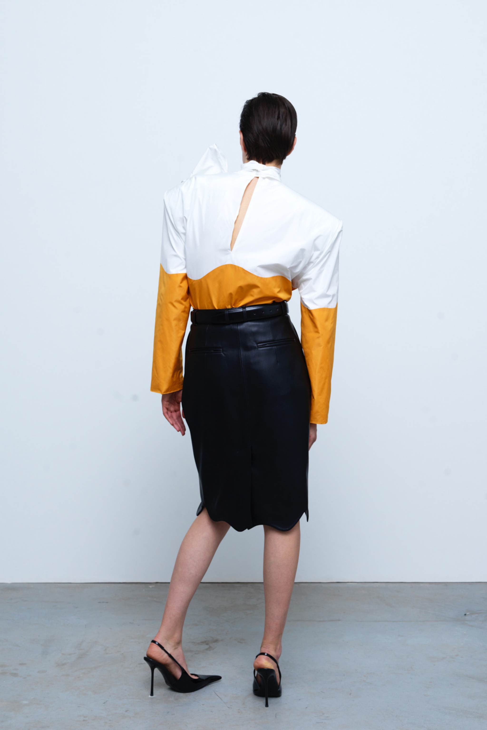 SKIRT#03 — Faux Leather Wave Hem Midi Skirt