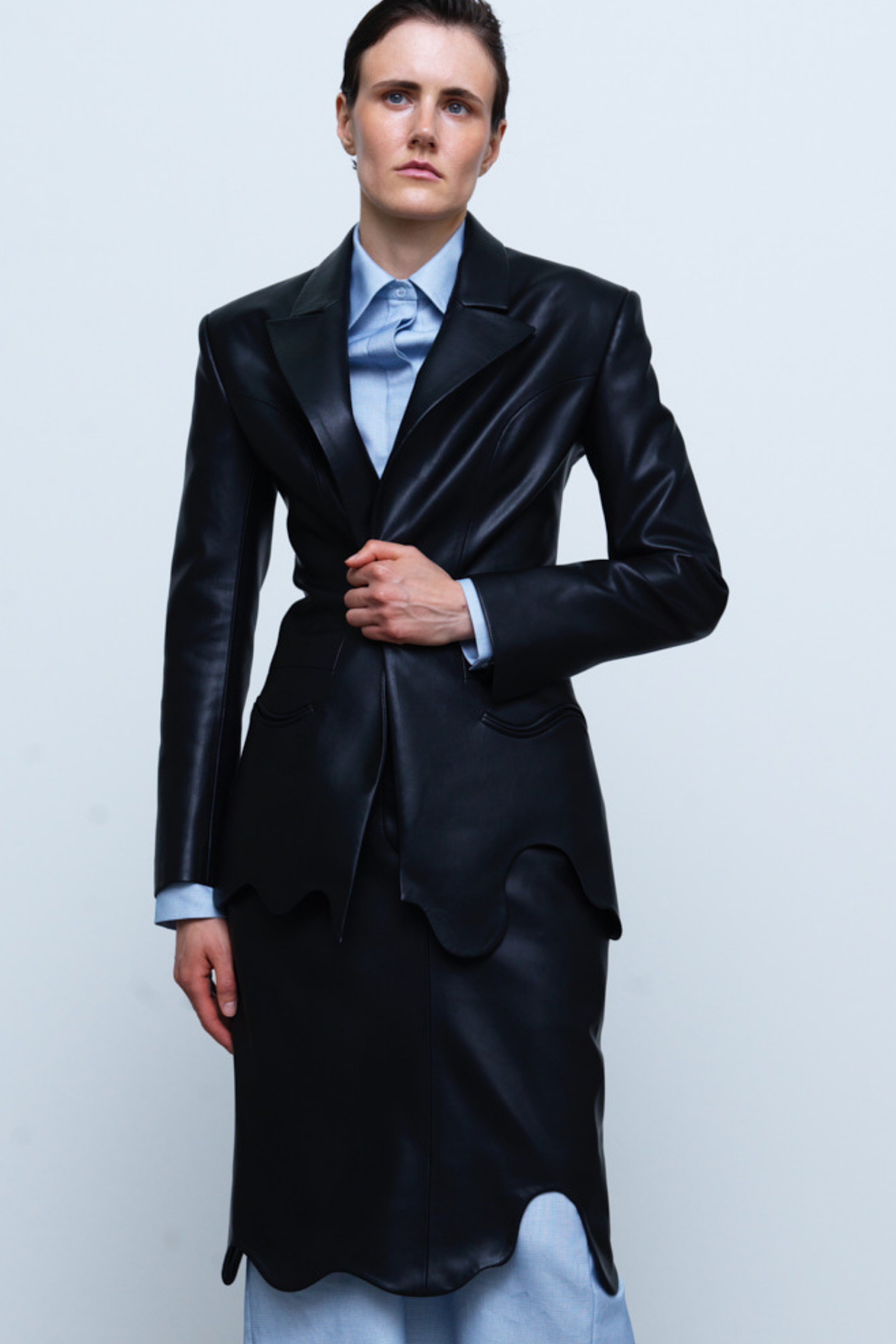 JACKET#01 — Wave-Hem Faux Leather Blazer