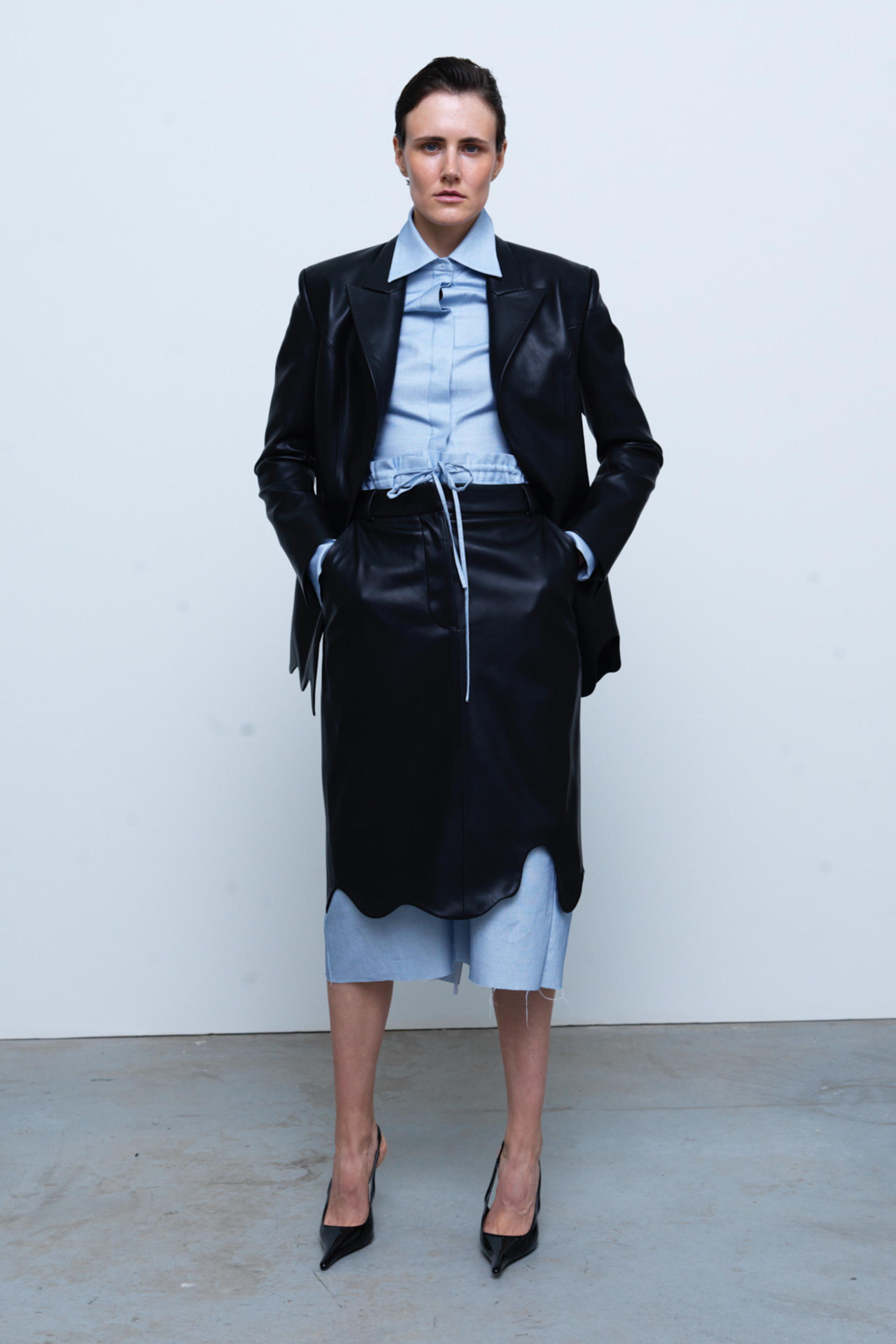 SKIRT#03 — Faux Leather Wave Hem Midi Skirt