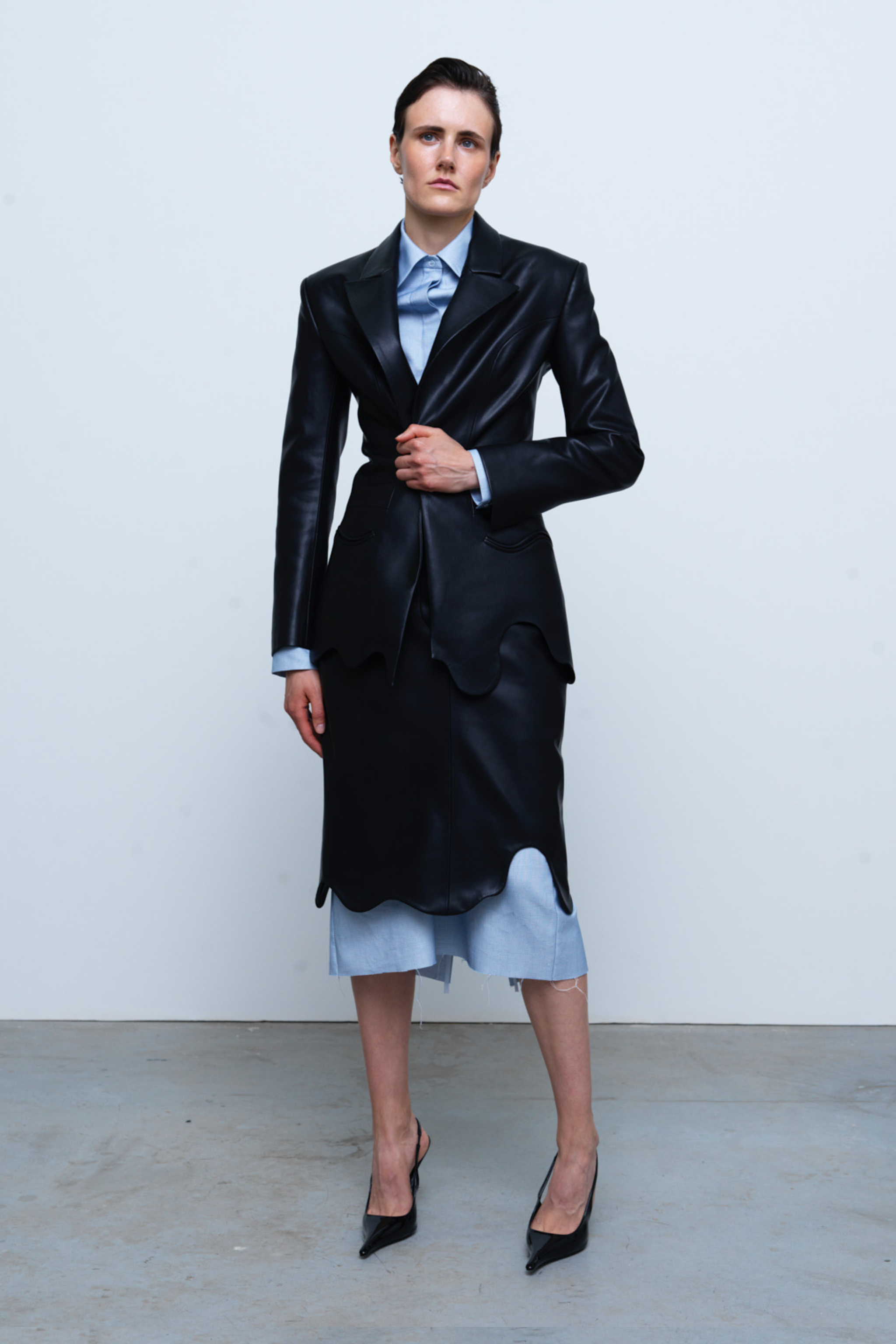 JACKET#01 — Wave-Hem Faux Leather Blazer